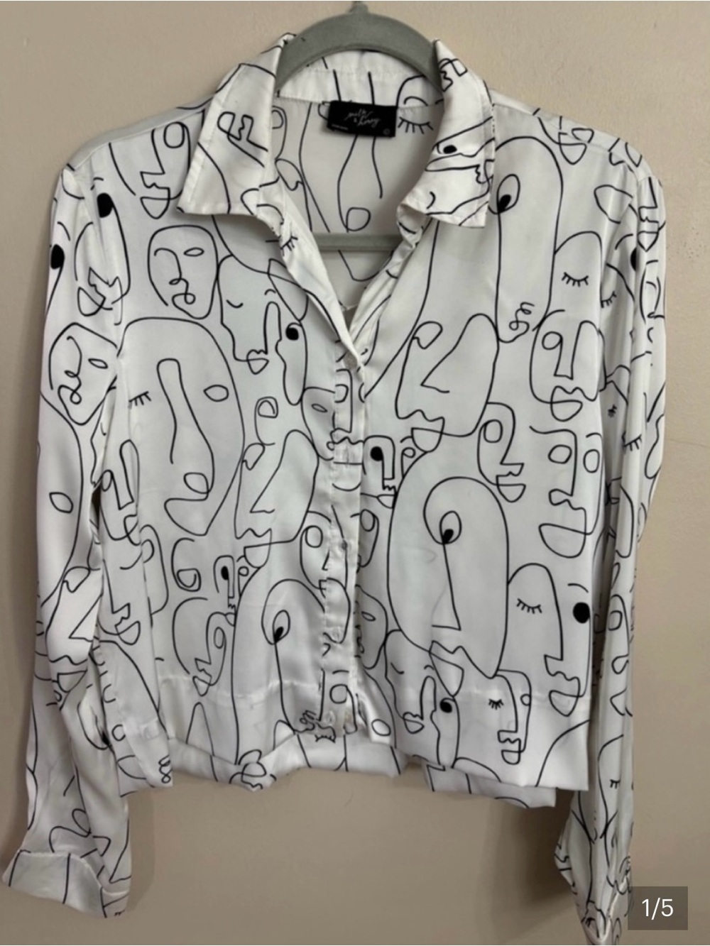 Milk and Honey Abstract Face Print White Button-Up Blouse